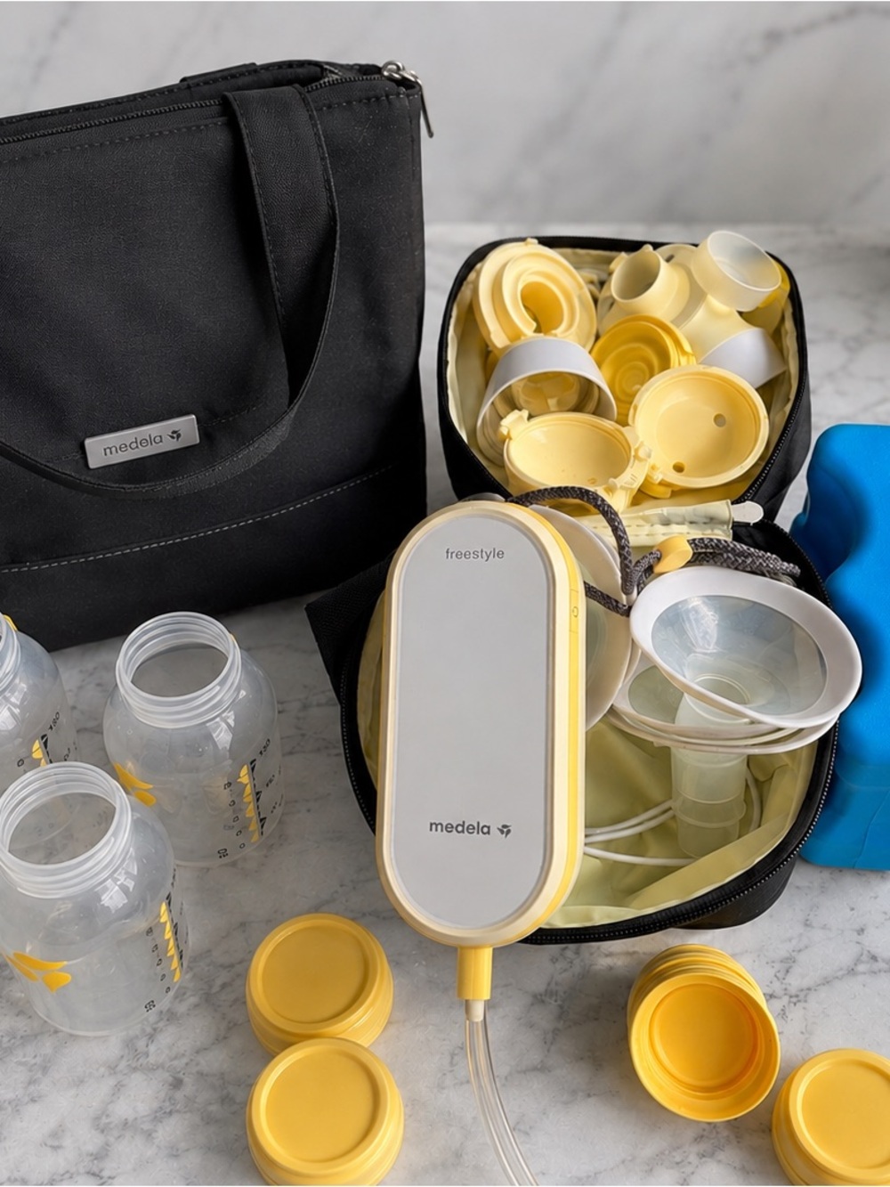 Medela Freestyle Breast Pump Kit in Yellow and White with Black Carrying Case